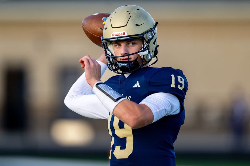 Tri-West Hendricks High School junior Jack Sorgi (19) warms up on the field before the start of an IHSAA varsity football game against Bishop Chatard High School, Friday, Oct. 10, 2025, at Tri-West Hendricks High School.