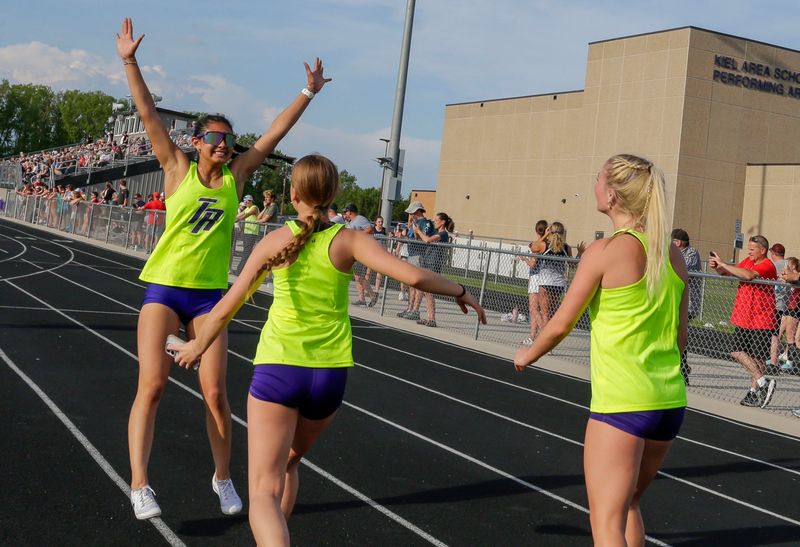 Two Rivers athletes express joy at their times, Tuesday, May 26, 2026, at the WIAA Div. 2 Regional Track and Field meet in Kiel, Wis.
