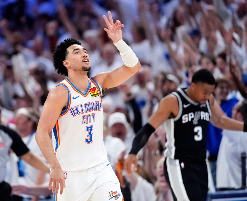 Oklahoma City's Jared McCain (3) celebrates a 3-point basket during Game 5 of the Western Conference Finals between the Oklahoma City Thunder and the San Antonio Spurs at Paycom Center in Oklahoma City, May 26, 2026.