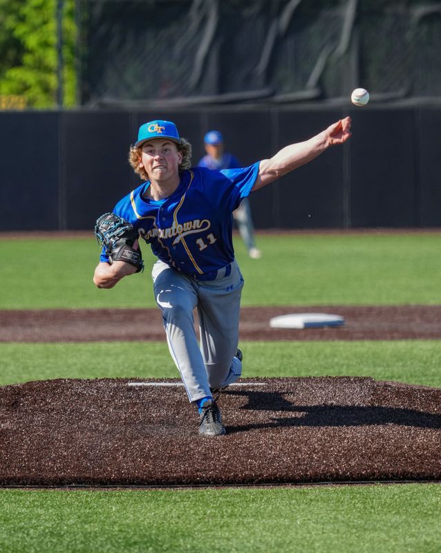Germantown's Landon Hagland (11) delivers a pitch during the game against Kettle Moraine at Lake Country DockHounds Stadium in Oconomowoc, Wisconsin, on May 28, 2026. Germantown won the game, 4-3.