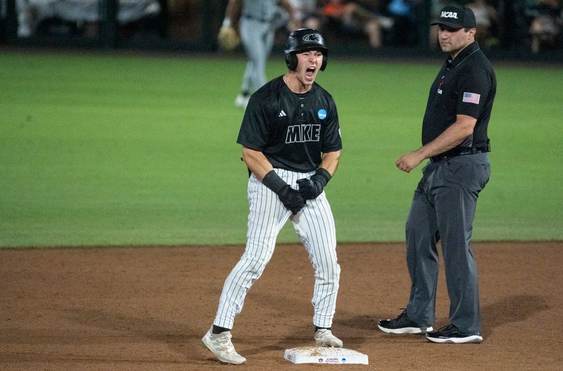 Milwaukee Panthers' Dylan O'Connell (2) celebrates his double as Milwaukee Panthers take on UCF Knights during the NCAA Regional Baseball tournament at Plainsman Park in Auburn, Ala. on Saturday, May 30, 2026.