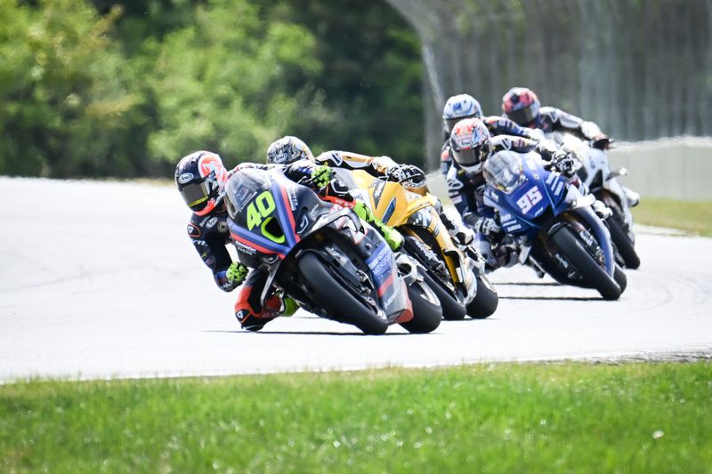 BMW rider Sean Dylan Kelly leads the pack into Turn 14 in the Superbike feature on the final day of MotoAmerica weekend May 31 at Road America in Elkhart Lake.