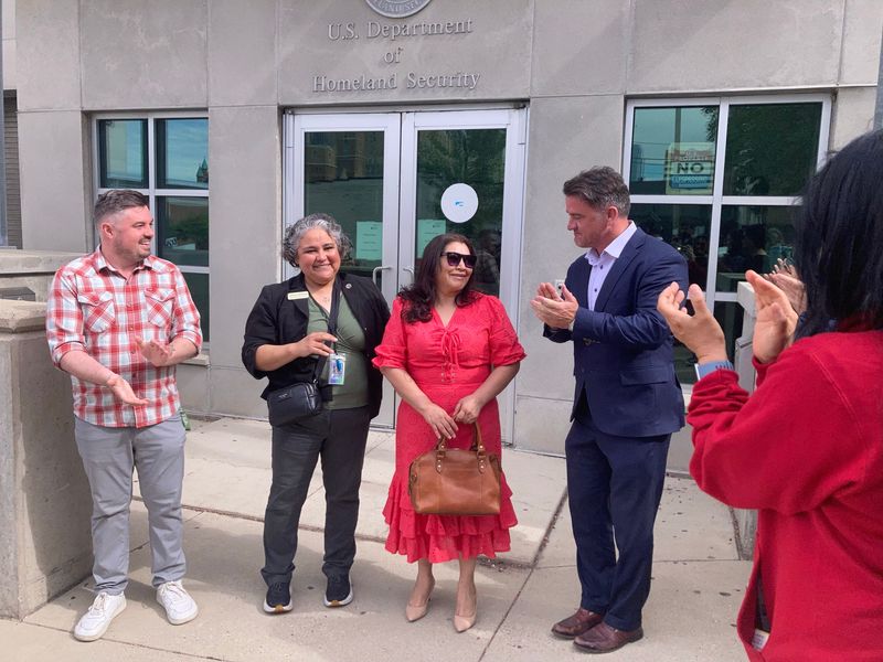 Elvira Benitez-Suarez (center) stands outside the U.S. Immigration and Customs Enforcement offices at 310 E. Knapp St. in Milwaukee on June 1, 2026. She was joined by her attorney, Marc Christopher, right, and Milwaukee Alds. Alex Brower and JoCasta Zamarripa, from left. Benitez-Suarez, a Sheboygan Falls woman who has lived in the U.S. for 36 years, was released from federal immigration custody after an extended legal battle in May.
