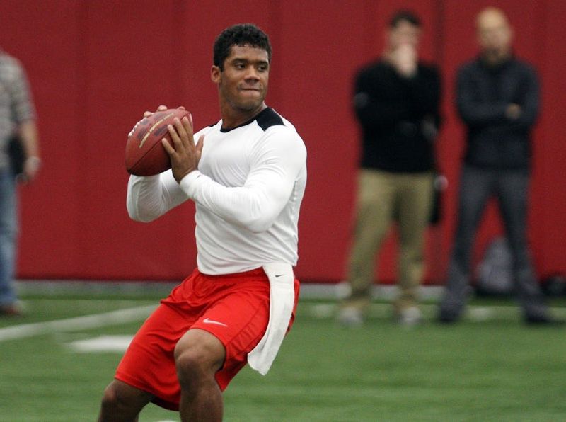 March 7, 2012; Madison, WI, USA; Wisconsin Badgers quarterback Russell Wilson prepares to throw a pass during pro day at the McClain Center. Mandatory Credit: Mary Langenfeld-USA TODAY Sports