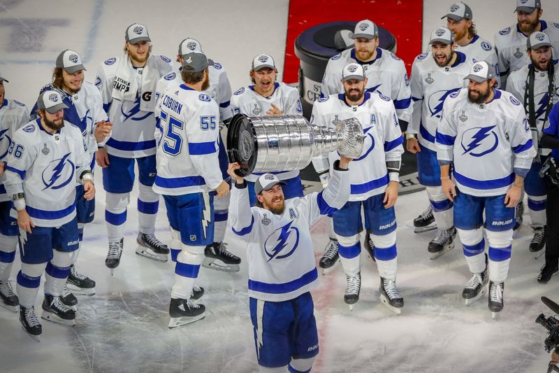 (EDITORS NOTE: CAPTION CORRECTION) Sep 28, 2020; Edmonton, Alberta, CAN; Tampa Bay Lightning defenseman Ryan McDonagh (27) hoists the Stanley Cup after the Lightning defeat the Dallas Stars in game six of the 2020 Stanley Cup Final at Rogers Place. Mandatory Credit: Perry Nelson-USA TODAY Sports