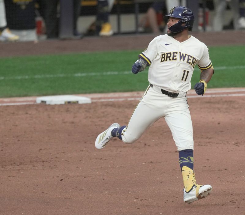 Milwaukee Brewers left fielder Jackson Chourio (11) rounds first base after hitting a two-run double during the second inning of their game against the San Francisco Giants Monday, June 1, 2026 at American Family Field in Milwaukee, Wisconsin.