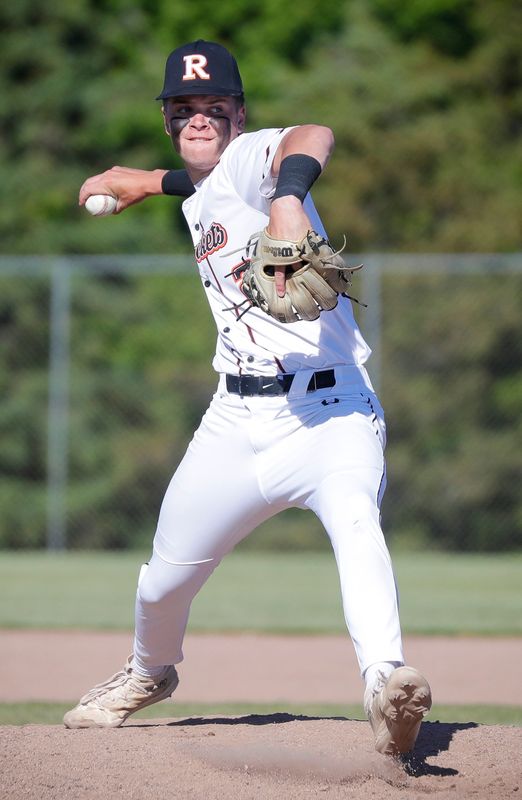 Cedar Grove-Belgium’s Carter Schmitz (2) winds up a pitch to Manitowoc Lutheran, Tuesday, June 2, 2026, in Cedar Grove, Wis.