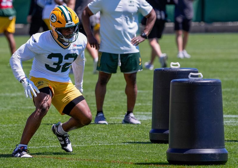 Green Bay Packers running back MarShawn Lloyd (32) runs through a drill during practice on Tuesday, June 2, 2026, at Ray Nitschke Field in Ashwaubenon, Wis. 
Tork Mason/USA TODAY NETWORK-Wisconsin