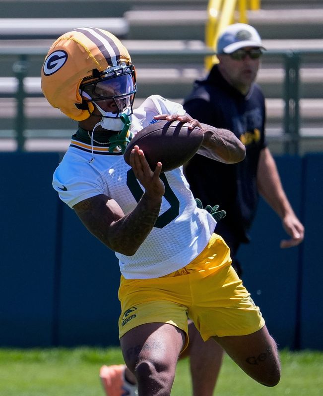 Green Bay Packers wide receiver Matthew Golden (0) catches a pass during practice on Tuesday, June 2, 2026, at Ray Nitschke Field in Ashwaubenon, Wis. 
Tork Mason/USA TODAY NETWORK-Wisconsin