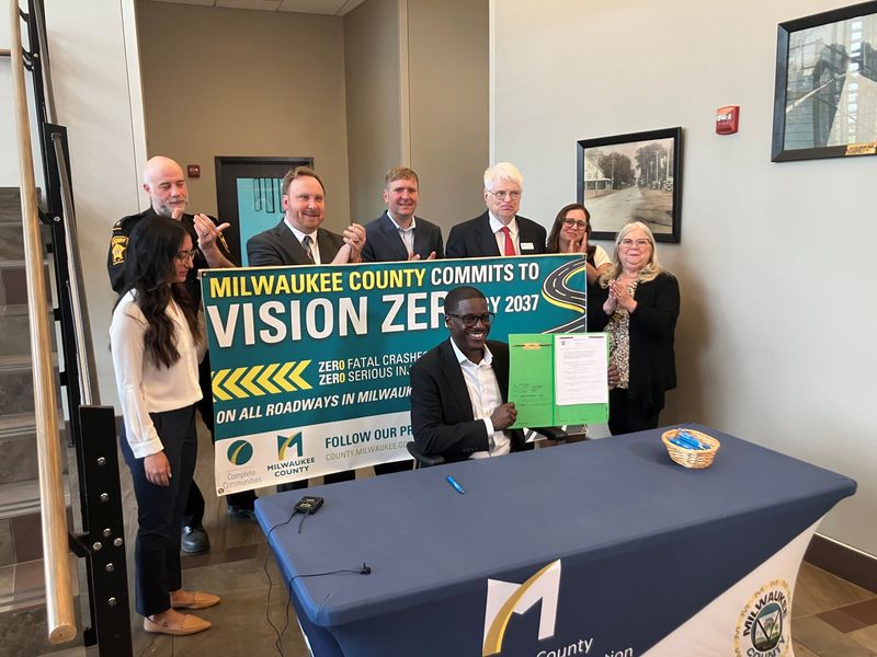 Milwaukee County Executive David Crowley signs into law a new ordinance allowing Sheriff deputies to impound vehicles involved in reckless driving.