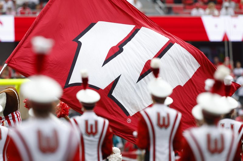 Sep 10, 2022; Madison, Wisconsin, USA; Wisconsin Badgers logo on a flag prior to the game against the Washington State Cougars at Camp Randall Stadium. Mandatory Credit: Jeff Hanisch-USA TODAY Sports