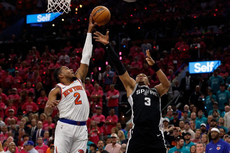 Jun 3, 2026; San Antonio, Texas, USA; New York Knicks guard Miles McBride (2) blocks the shot of San Antonio Spurs forward Keldon Johnson (3) in the second half during game one of the 2026 NBA Finals at Frost Bank Center. Mandatory Credit: Geoff Burke-Imagn Images