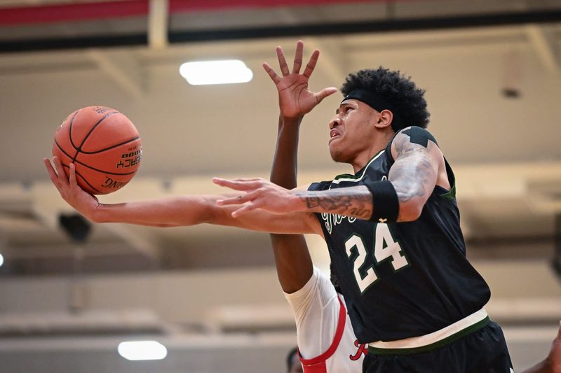 Wauwatosa West guard Jalen Brown (24) puts up a shot against Wauwatosa East in a game Friday, December 12, 2025, at Wauwatosa East High School in Wauwatosa, Wisconsin. West won 74-63.