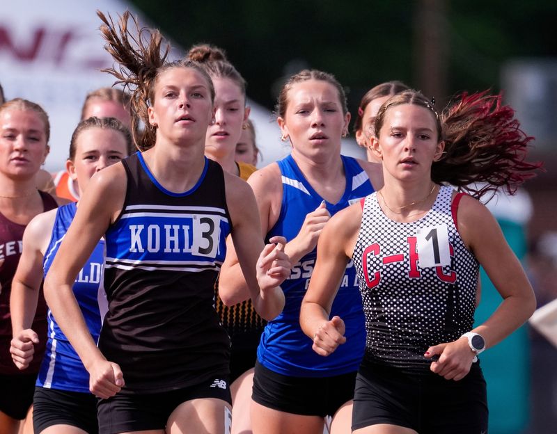 Kohler High School's Maggie Behler (3) and Cochrane-Fountain City High School's Addy Duellman (1) compete in the Division 3 girls 1,600-meter run during the first day of the WIAA state track and field meet on Friday, June 5, 2026, at Veterans Memorial Field Sports Complex in La Crosse, Wis. 
Tork Mason/USA TODAY NETWORK-Wisconsin