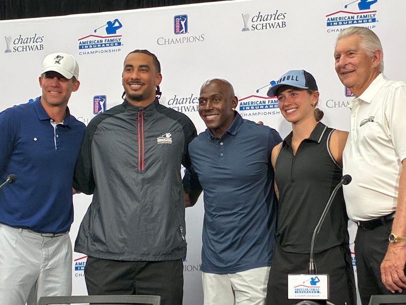 Packers quarterback Jordan Love, second from left, poses with AmFam Championship celebrity foursome, from left, Jordy Nelson, Donald Driver, Caroline “K.K” Harvey and Andy North.