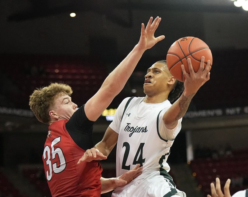 Wauwatosa West's Jalen Brown (24) battles for a shot against Wausau East's Charlie Cayley (35) in their WIAA Division 2 state semifinal basketball game, Friday, March 21, 2025, at the Kohl Center in Madison, Wis.