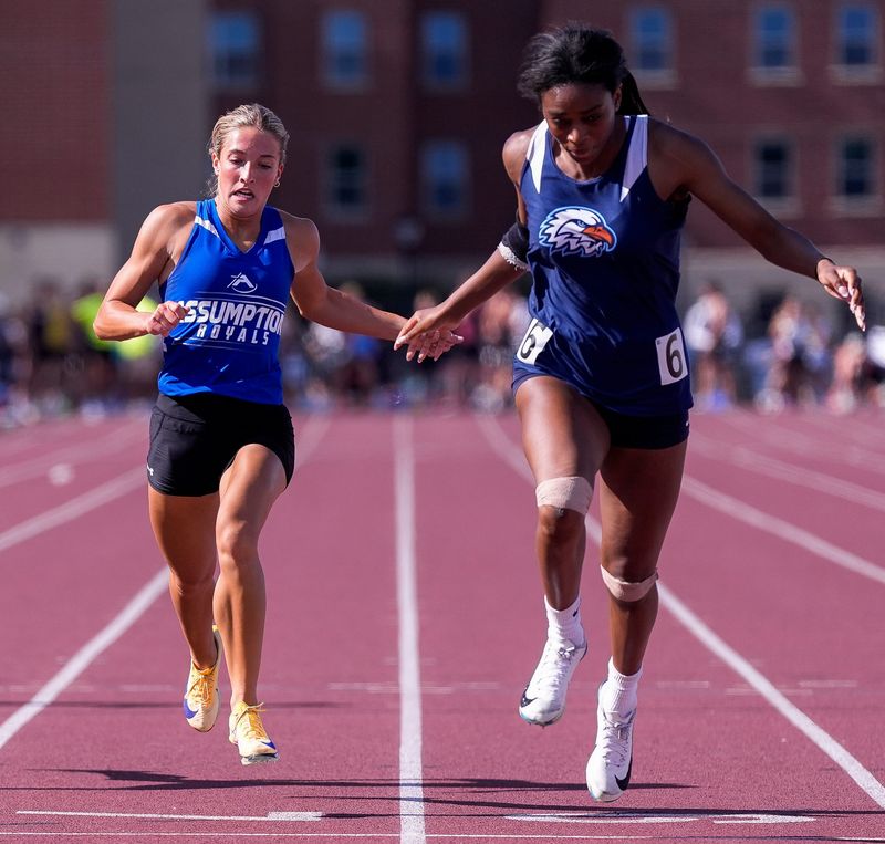 Assumption High School’s Bella Thomas crosses the finish line of the Division 3 girls 200-meter dash final during the second day of the WIAA state track and field meet on Saturday, June 6, 2026, at Veterans Memorial Field Sports Complex in La Crosse, Wis. 
Tork Mason/USA TODAY NETWORK-Wisconsin