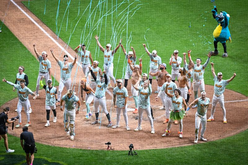 The Loco Beach Coconuts celebrate after a 4-2 victory over the Party Animals in a Banana Ball game Saturday, June 6, 2026, at American Family Field in Milwaukee, Wisconsin.