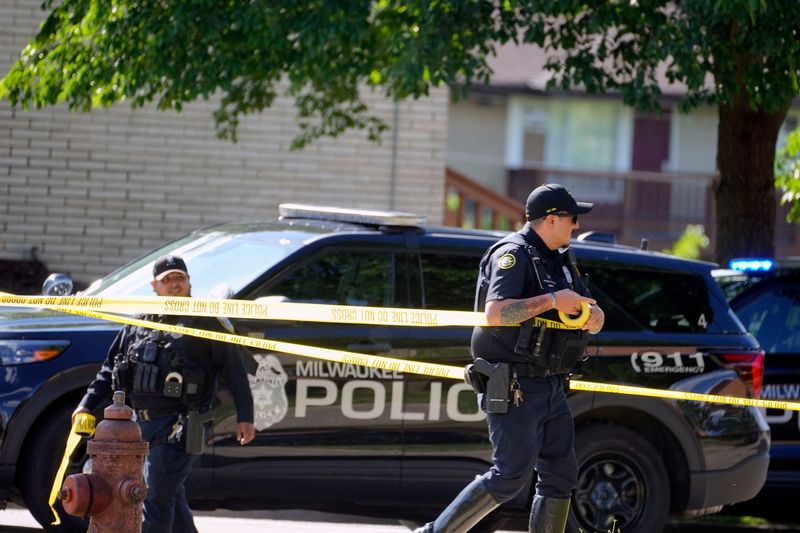 Milwaukee Police Officer tapes off area near N. 84th and W. Bender on June 12, 2026 near the scene of a Milwaukee police incident that left one dead in Milwaukee, Wisconsin.