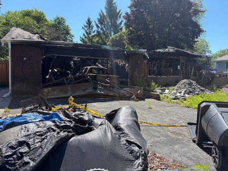 The remains of a November 2025 house fire that killed two sisters in Howard.