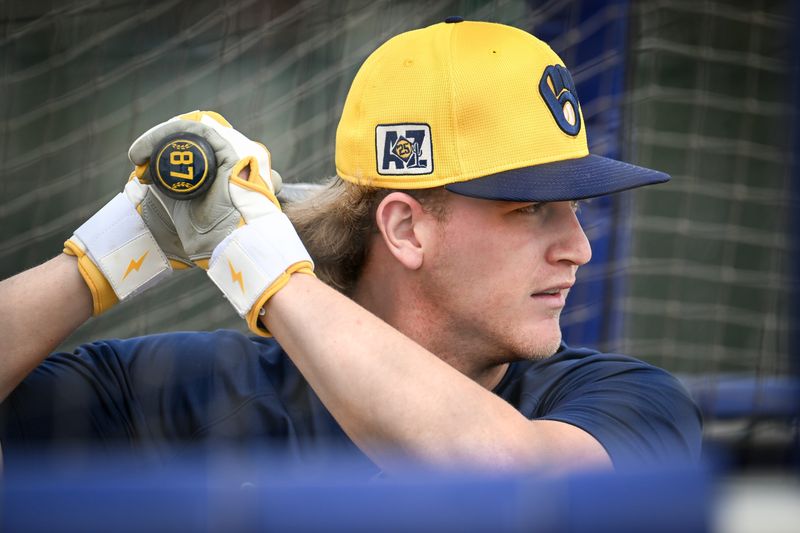 Milwaukee Brewers shortstop Cooper Pratt takes batting practice during spring training workouts Monday, February 17, 2025, at American Family Fields of Phoenix in Phoenix, Arizona.