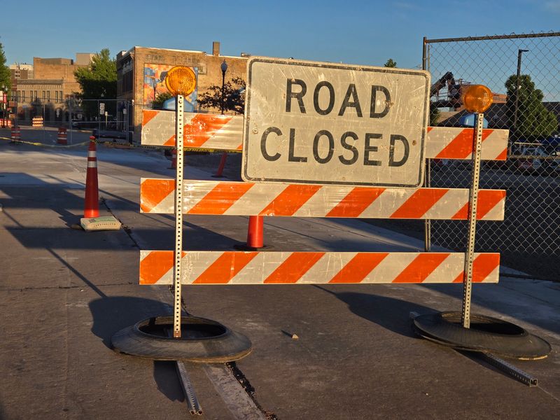 Road closed signs are seen around Wisconsin, like this one on a street near downtown Oshkosh, Wisconsin, in June 2026.