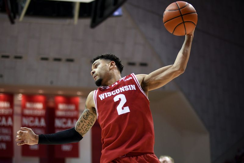 Feb 7, 2026; Bloomington, Indiana, USA; Wisconsin Badgers guard Nick Boyd (2) rebounds the ball against the Indiana Hoosiers during the first half at Simon Skjodt Assembly Hall. Mandatory Credit: Robert Goddin-Imagn Images
