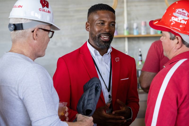 Marcus Sedberry, deputy athletic director/chief operating officer for Wisconsin Athletics, is shown during the program recognizing donors for the Kellner Center Athletic Center at UW-Madison in Madison, Wisconsin. The estimated cost of the project is $285 million. Ted and Mary Kellner are major donors.