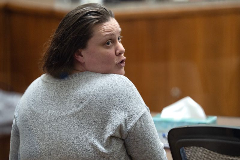 Amandria Brunner mouths “I love you” to family sitting behind her, during a break in her trial, in the Milwaukee County Safety Building on June 17, 2026 in Milwaukee, Wisconsin.