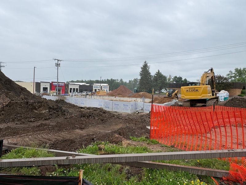 Construction is underway Wednesday, June 17, 2026, for a new Chipotle Mexican Grill restaurant next to the former BMO bank building at 1305 N. Central Ave. in Marshfield, Wisconsin, and in front of the Harbor Freight store in the Marshfield Towne Centre development.