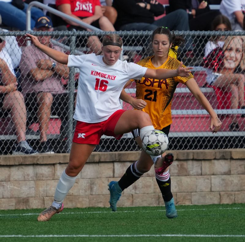 Kimberly's Vada Sousek (16) traps a pass during the WIAA Division 1 state girls soccer semifinal against Divine Savior Holy Angels on Thursday, June 18, 2026, at Uihlein Soccer Park in Milwaukee, Wisconsin.