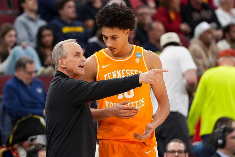 Tennessee coach Rick Barnes speaks with Tennessee forward Nate Ament (10) during a NCAA Tournament Sweet 16 game between Tennessee and Iowa State at the United Center in Chicago on March 27, 2026.
