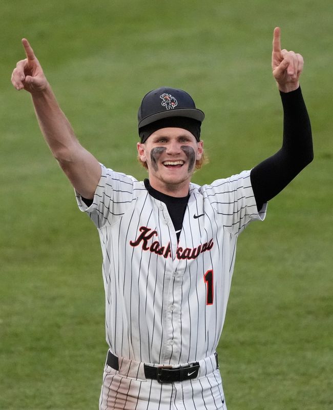 Kaukauna High School's Bron Schaefer (1) celebrates after defeating Madison Memorial High School during their WIAA Division 1 championship baseball game Thursday, June 18, 2026, at Neuroscience Group Field at Fox Cities Stadium in Grand Chute, Wisconsin. Kaukauna won 11-5. Dan Powers/USA TODAY NETWORK-Wisconsin