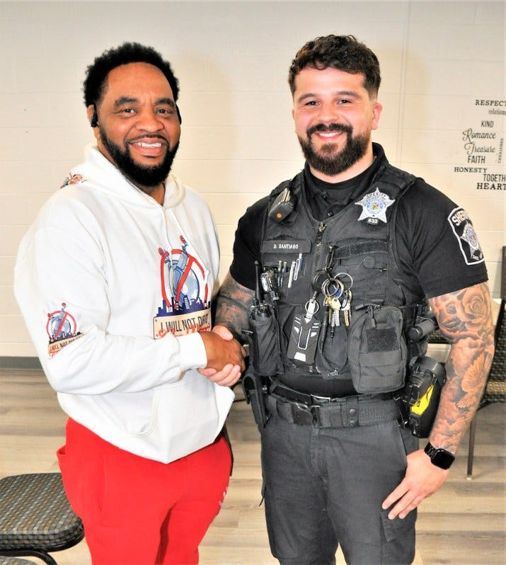 Monte Mabra (left) and Milwaukee Police Officer Deputy Dennis Santiago (right)