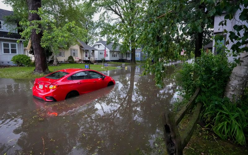 An abandoned vehicle is seen on Wednesday, June 24, 2026, along Antoinette Street in Green Bay, Wis. An intense thunderstorm dropped more than two inches in approximately 45 minutes, causing widespread flash flooding.
Tork Mason/USA TODAY NETWORK-Wisconsin
