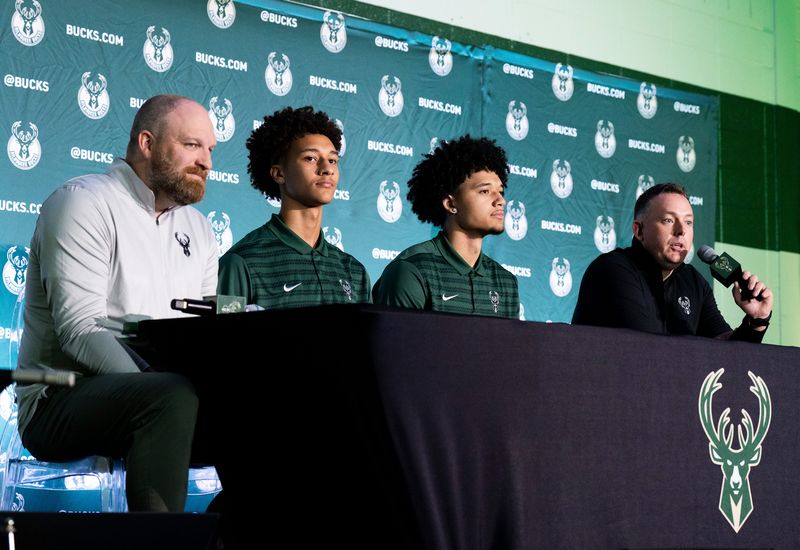Milwaukee Bucks head coach Taylor Jenkins, from left, first-round draft picks Nate Ament and Brayden Burries and general manager Jon Horst sit together at the players' introductory news conference June 25 at the Pieper-Hillside Boys & Girls Club.