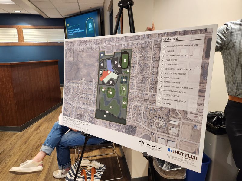 A board shows future site plans for a new Christian school, Comenius Academy, June 24, 2026 in Greenville, Wisconsin.