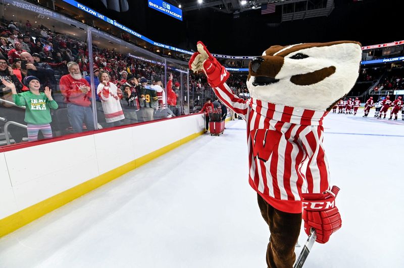 Bucky Badger fires up Wisconsin fans after a 4-3 victory over the Connecticut Huskies in the championship game of the Kwik Trip Holiday Face-Off on Sunday, December 29, 2024, at Fiserv Forum in Milwaukee, Wisconsin.