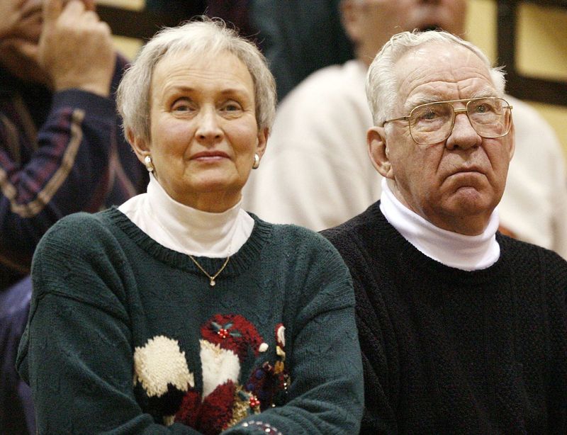 Ron Einerson and his wife, Delores, watch the Neenah High School boys basketball team play a game against Menasha during the 2006 season. Einerson passed away recently at age 93.