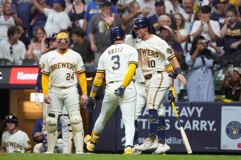 Brewers right fielder Sal Frelick cheers as shortstop Joey Ortiz crosses home plate after hitting a go-ahead two-run home run against the Cincinnati Reds in the eighth inning June 29 at American Family Field.