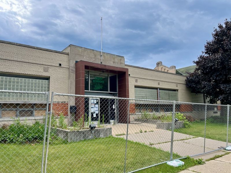 Tower Academy on North Sixth Street is surrounded by fencing, as seen July 2, 2026, in Sheboygan, Wis. It's set to be demolished.