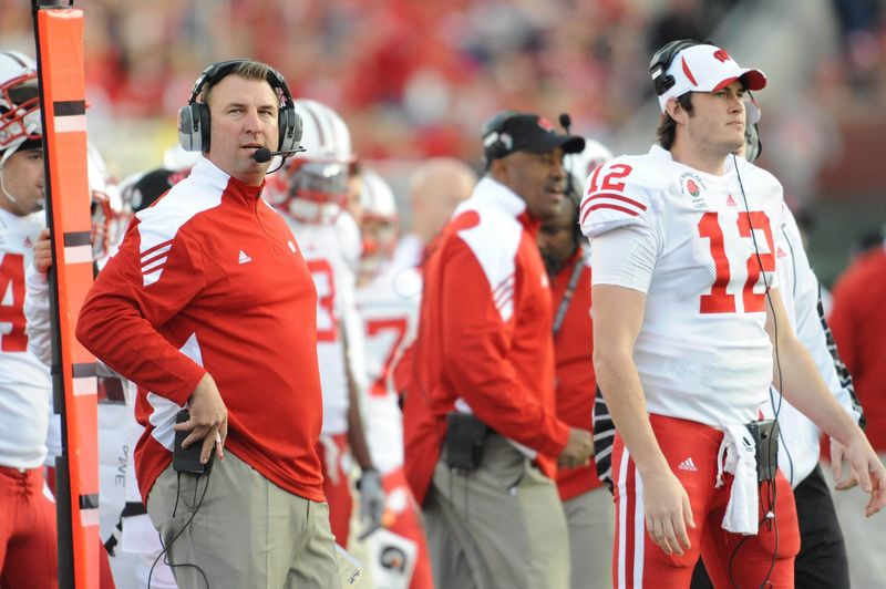 Jan 1, 2011; Pasadena, CA, USA; Wisconsin Badgers head coach Bret Bielema (left) watches from the sidelines with quarterback Nate Tice (12) while playing against the TCU Horned Frogs during the 2011 Rose Bowl. Mandatory Credit: Jayne Kamin-Oncea-USA TODAY Sports
