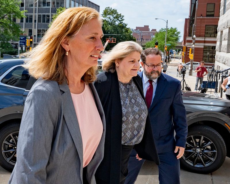 Former Milwaukee County Judge Hannah Dugan, center, enters the Milwaukee Federal Building & U.S. Courthouse before her sentencing in Milwaukee, Wisconsin on July 8, 2026.