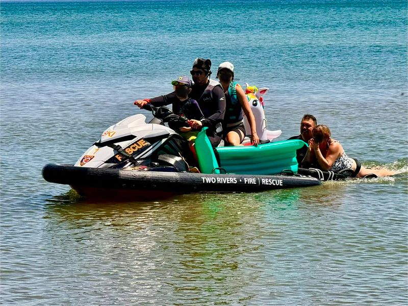 Two adults and a child were rescued from Lake Michigan on July 14, 2026, after wind and currents pushed them about a half-mile offshore near Rawley Point in Two Rivers.