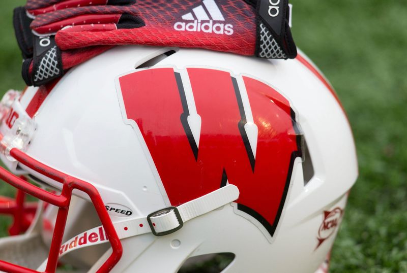 Nov 15, 2014; Madison, WI, USA; A Wisconsin Badgers helmet sits on the field during warmups prior to the game against the Nebraska Cornhuskers at Camp Randall Stadium.  Wisconsin won 59-24.  Mandatory Credit: Jeff Hanisch-USA TODAY Sports