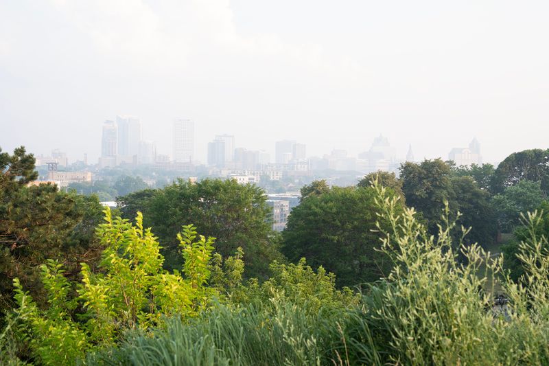 A view of downtown Milwaukee, through the haze of the Canadian wildfire smoke, seen from the Kilbourn Reservoir Park on July 15, 2026 in Milwaukee, Wisconsin.
