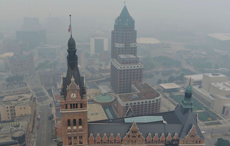 Smoke from wildfires in Canada and northern Minnesota hangs over downtown Milwaukee, Wisconsin, on July 16, 2026.