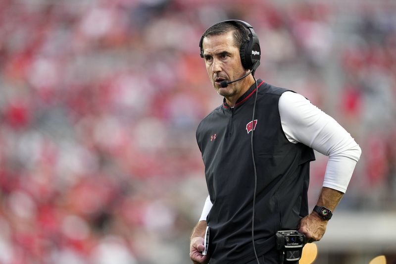 Oct 18, 2025; Madison, Wisconsin, USA; Wisconsin Badgers head coach Luke Fickell looks on in the second half against the Ohio State Buckeyes at Camp Randall Stadium. Mandatory Credit: Jeff Hanisch-Imagn Images