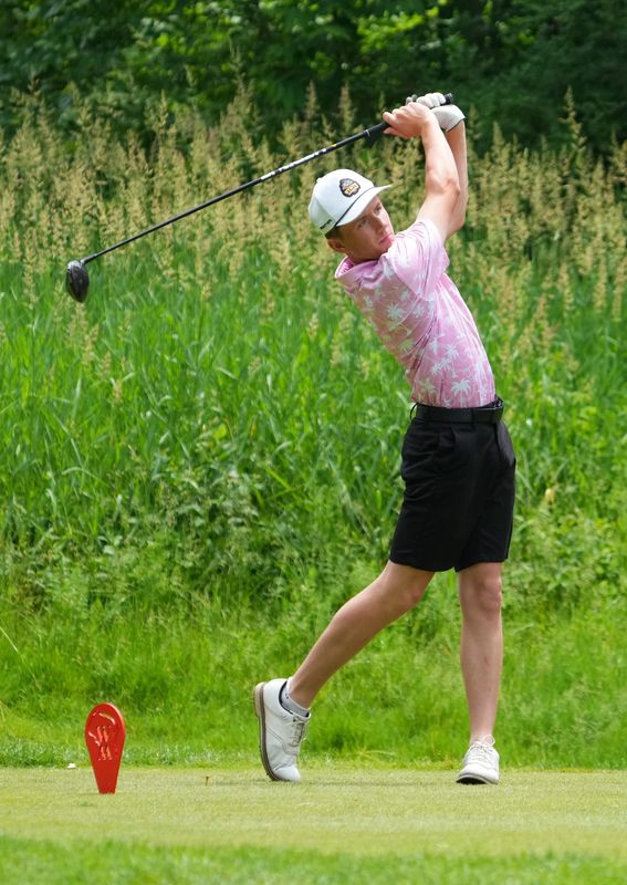 Defending champion Vince Sigl fired a 1-under 70 to move into fourth place, two behind the leaders, after two rounds of the Wisconsin Amateur Championship on Tuesday, July 21 at West Bend Country Club.