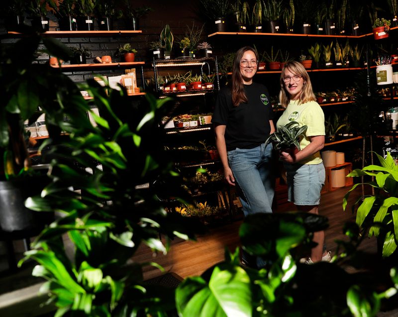 Owners of Collective Plant Co. Erica Howard and Erin Olsen pictured in their store on July 20, 2026, in De Pere, Wis.